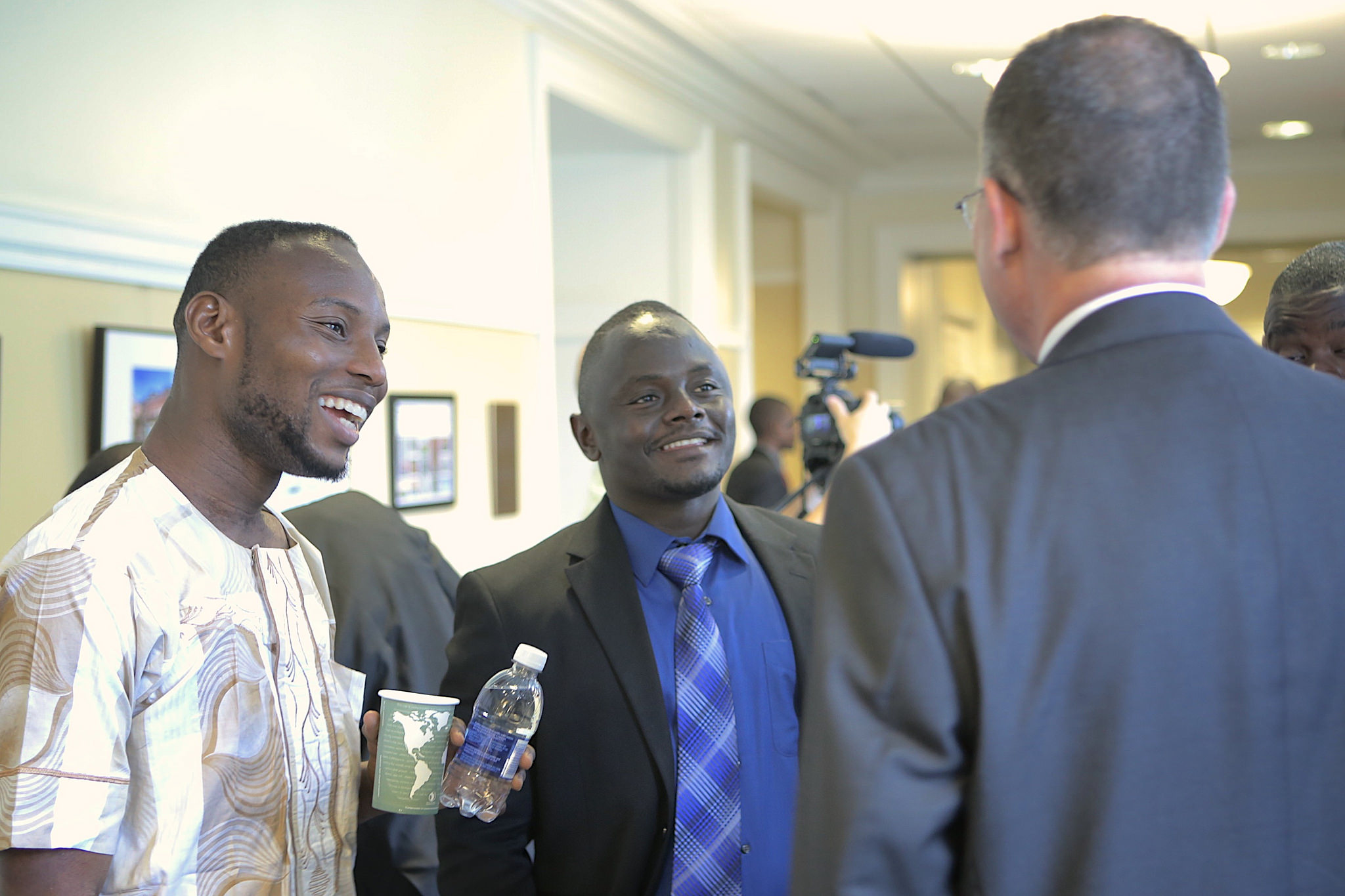 Two YALI Fellows chatting at the 2015 Africa Business Forum